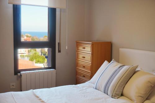 Ένα ή περισσότερα κρεβάτια σε δωμάτιο στο APARTAMENTO PORTUTXU