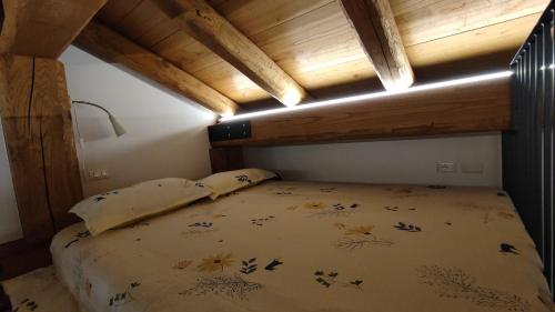Postel nebo postele na pokoji v ubytování B&B Al Vecchio Torchio