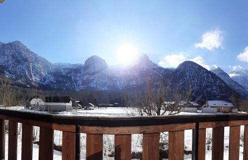 a view of a mountain range with snow on the ground at Dachstein Adventure in Obertraun