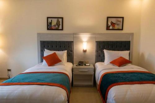 Katil atau katil-katil dalam bilik di Petra Canyon Hotel