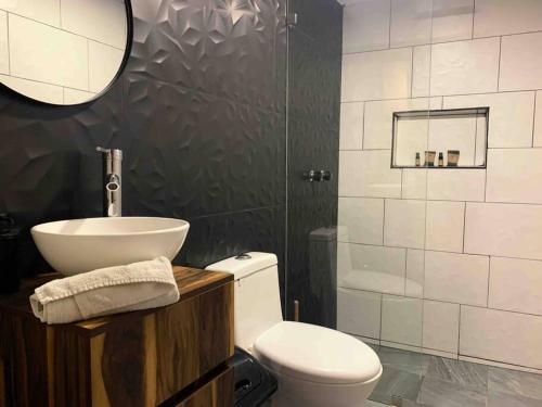 Koupelna v ubytování Begonias Loft