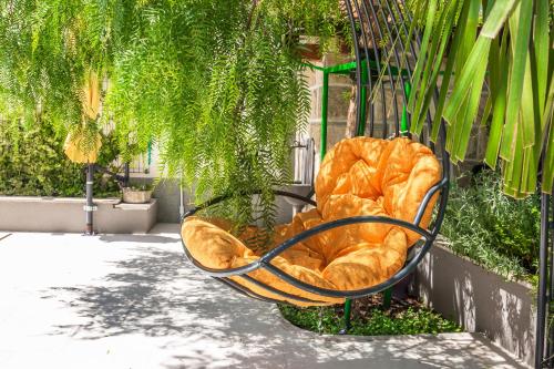two loaves of bread are sitting on a bench at Private seaside Morska Villa with pool in Baška Voda, Dalmatia, Croatia in Baška Voda