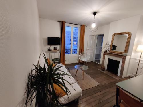 Photo de la galerie de l'établissement Appartement cosy à 10 min à pieds de la gare, à Reims