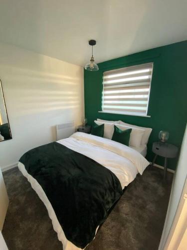 Un pat sau paturi într-o cameră la Chester's Retreat