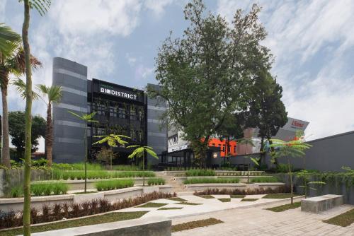 a rendering of a building with trees in front of it at Nindya Biodistrict Hotel Bandung in Bandung