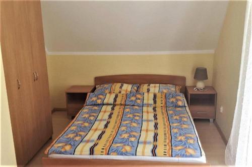 Ένα ή περισσότερα κρεβάτια σε δωμάτιο στο Holiday homes, Niechorze