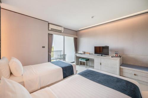 Katil atau katil-katil dalam bilik di Manhattan Pattaya Hotel - SHA Extra Plus