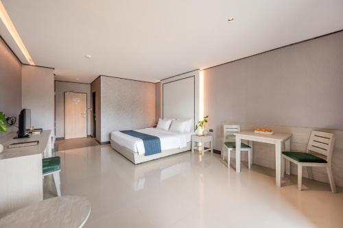 Katil atau katil-katil dalam bilik di Manhattan Pattaya Hotel - SHA Extra Plus