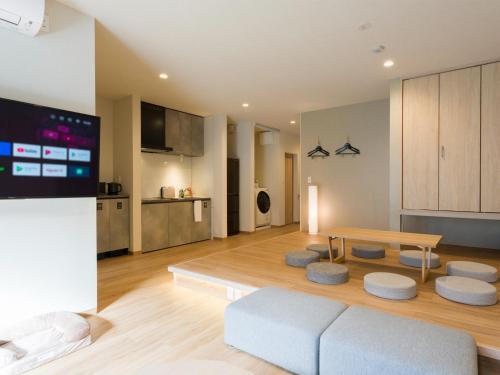 a living room with a couch and a table at Rakuten STAY Nikko Hoden Capacity of 8 persons in Nikko