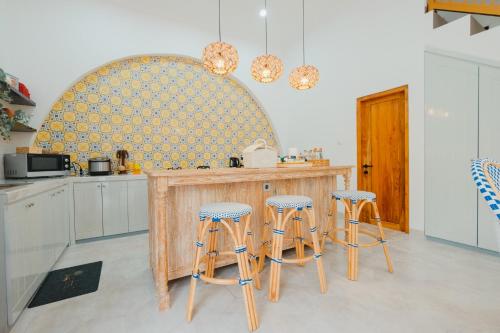 Кухня или мини-кухня в Villa Ruang Rindu Malioboro
