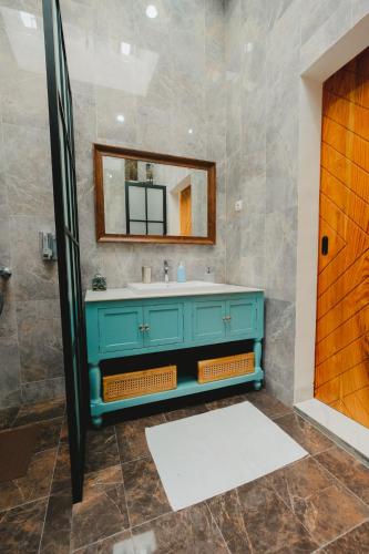 Ванная комната в Villa Ruang Rindu Malioboro