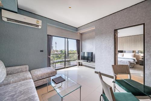Ruang duduk di Manhattan Pattaya Hotel - SHA Extra Plus