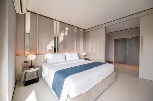 Katil atau katil-katil dalam bilik di Manhattan Pattaya Hotel - SHA Extra Plus