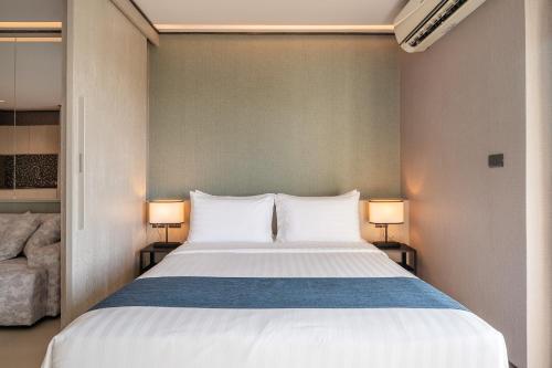 Katil atau katil-katil dalam bilik di Manhattan Pattaya Hotel - SHA Extra Plus