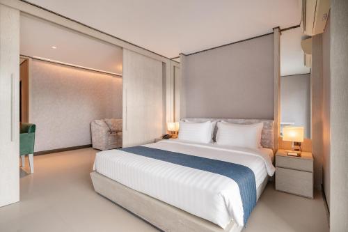 Katil atau katil-katil dalam bilik di Manhattan Pattaya Hotel - SHA Extra Plus