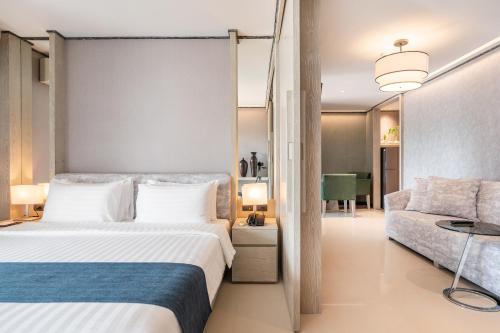 Katil atau katil-katil dalam bilik di Manhattan Pattaya Hotel - SHA Extra Plus
