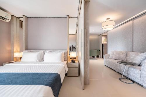 Katil atau katil-katil dalam bilik di Manhattan Pattaya Hotel - SHA Extra Plus