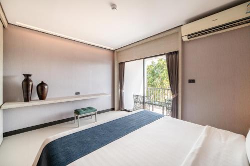 Katil atau katil-katil dalam bilik di Manhattan Pattaya Hotel - SHA Extra Plus