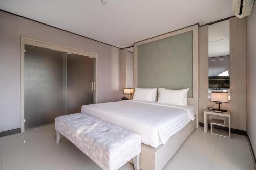 Katil atau katil-katil dalam bilik di Manhattan Pattaya Hotel - SHA Extra Plus