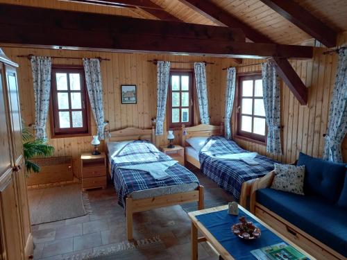 Postel nebo postele na pokoji v ubytování Black Sheep Apartmant