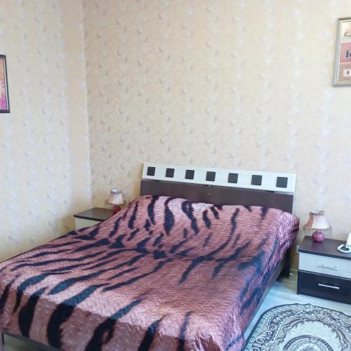Postel nebo postele na pokoji v ubytování У КоТа