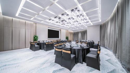 HUALUXE Xi'an Chanba by IHG-西安浐灞华邑酒店-Near Xi'an International Convention Exhibition Center and Shopping mall and The Romantic show of Xi'an-Free Luggage Storage-English Serviceにあるシーティングエリア
