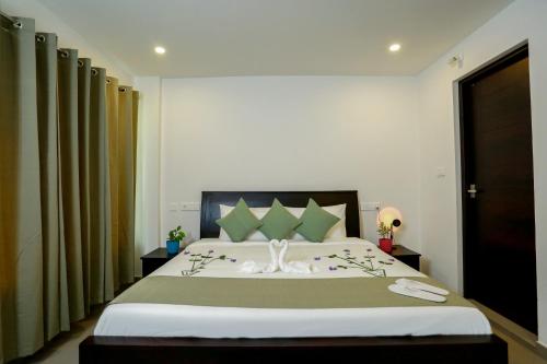 Cama o camas de una habitación en SATRA WAYANAD