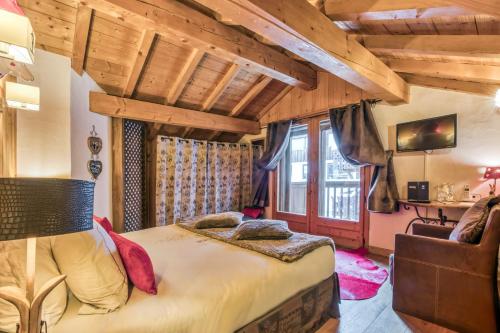 Postel nebo postele na pokoji v ubytování Les Monts Charvin