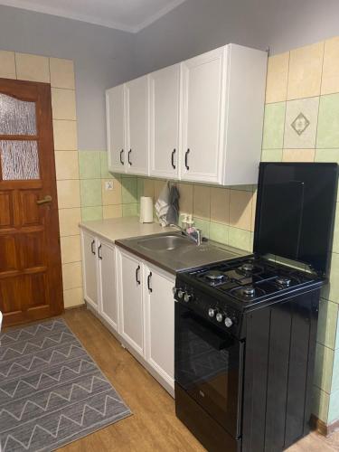 Una cocina o zona de cocina en Apartament nad Stawkiem