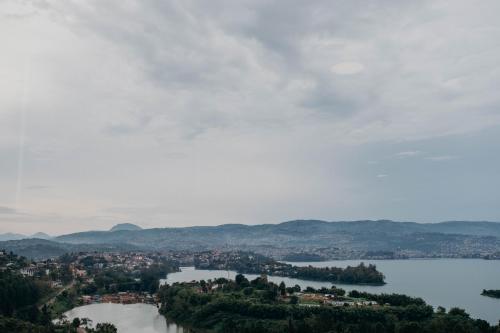 a view of a lake and a city at Mantis Kivu Marina Bay Hotel in Muhari