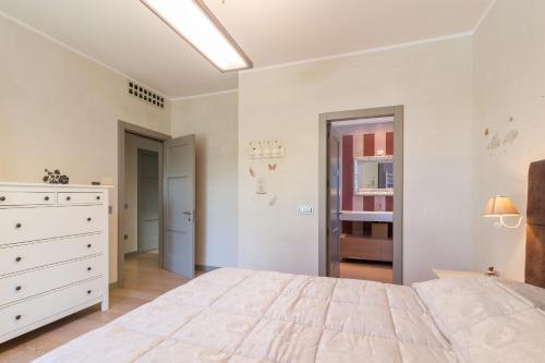 Un pat sau paturi într-o cameră la Villa Laura