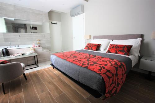 Postel nebo postele na pokoji v ubytování il sogno di afrodite luxury b and b