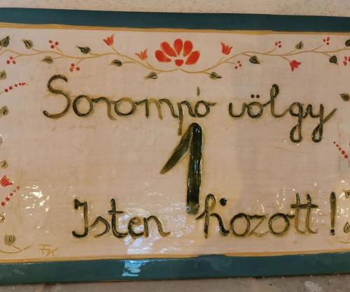 a white cake with a message on it at Illaberek Vendégház in Sukoró
