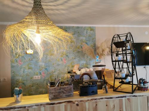 a shelf with a bunch of items on it at Illaberek Vendégház in Sukoró