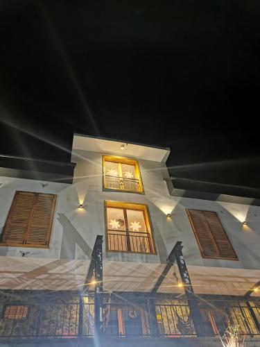 a group of windows on the side of a building at Illaberek Vendégház in Sukoró