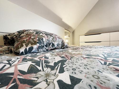 Una cama o camas en una habitación de La Goguette - Charmant gîte chez le vigneron