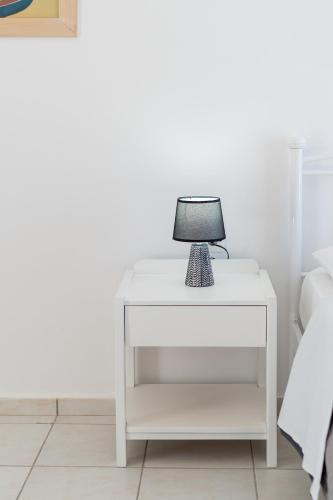 Postel nebo postele na pokoji v ubytování Azure Seaside Apts