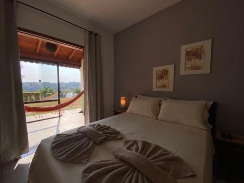 Un pat sau paturi într-o cameră la Pousada San Lorenzo