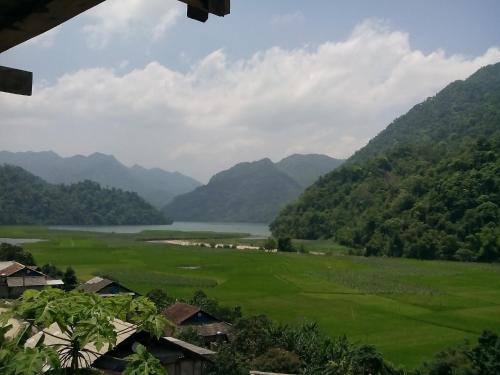 a view of a valley with a river and mountains at Ba Be Lake View Homestay in An Ma