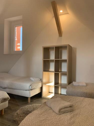 Postel nebo postele na pokoji v ubytování Auberge du Parc