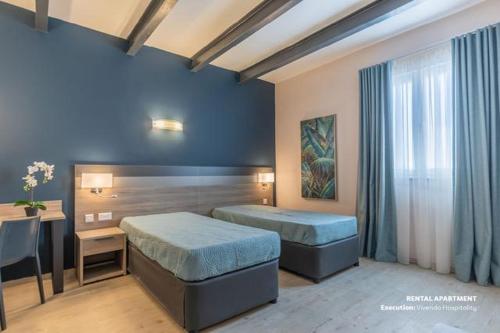Cama ou camas em um quarto em No. 31 in Valletta