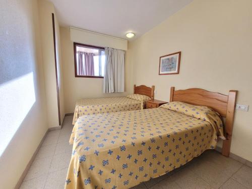 Postel nebo postele na pokoji v ubytování Europa Center-Fincas Benidorm