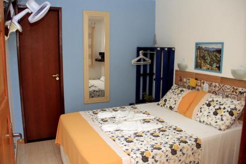 Katil atau katil-katil dalam bilik di Camping e Chalés Beira Mar