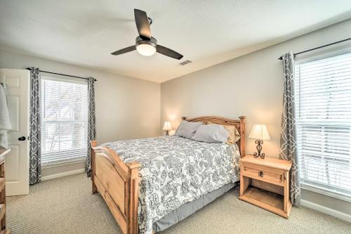 a bedroom with a bed and a ceiling fan at Cozy Sapphire Resort Home with Deck and Mountain Views in Sapphire