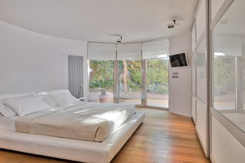 Postel nebo postele na pokoji v ubytování Luxurious Villa Philoxenia