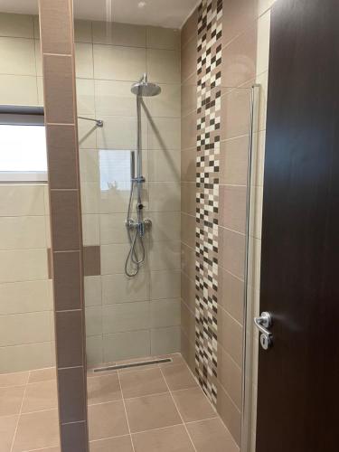 Ένα μπάνιο στο Malibu Apartman & Jacuzzi