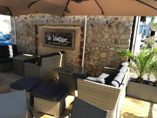 Χώρος καθιστικού στο Le Relais De La Place