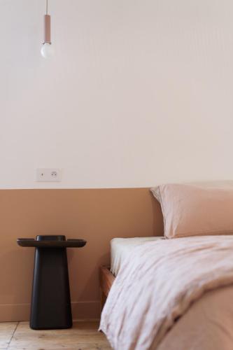 Ένα ή περισσότερα κρεβάτια σε δωμάτιο στο Le Clos Dagobert