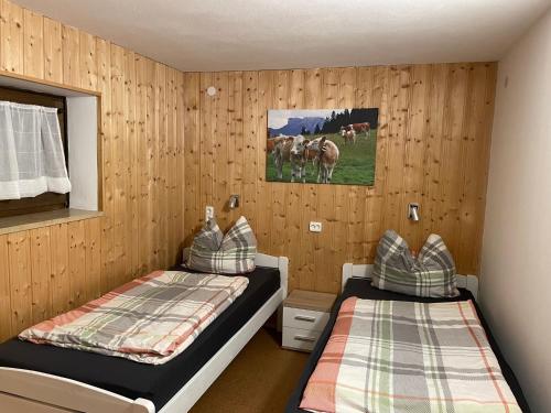 Postel nebo postele na pokoji v ubytování Großzügiges Domizil, 90qm, mit Terrasse, Garten, Infrarotkabine und Garage