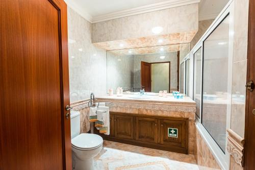 Ett badrum på Azores Apartment
